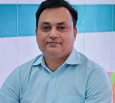 Dr. Manik Mazumder