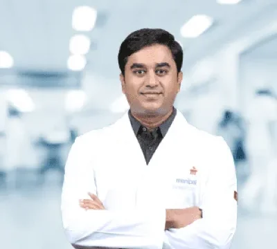 DR. SUMUKH M